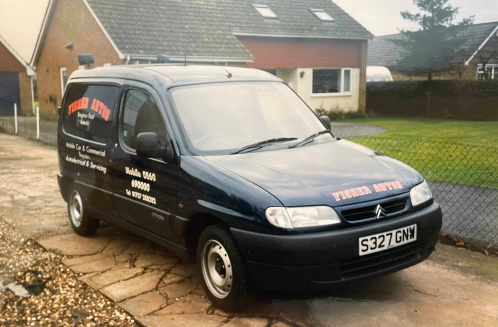 A picture of an old Fisher Autos' van